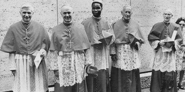 Five new cardinals created by the Pope at the Vatican, 27th June 1977. From left to right, they are Cardinal Joseph Ratzinger of Germany (later Pope Benedict XVI), Cardinal Giovanni Benelli, the former Vatican Under-Secretary of State, Cardinal Bernardin Gantin of Benin, Cardinal Frantisek Tomasek of Prague, and Cardinal Mario Luigi Ciappi, a Vatican theologian. 