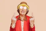 funny-stylish-elderly-grandmother-showing-middle-finger-of-both-hands[1].webp
