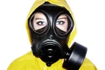 joe-fox-fine-art--woman-wearing-gas-mask-and-protective-clothing-joe-fox[1].webp