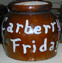 large brown jug with lettering that reads, Carberry Friday