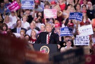 During a rally in Phoenix on Tuesday, President Trump blamed the news media for the country’s deepening divisions, saying it had failed to properly report his remarks on the violence in Charlottesville, Va.
